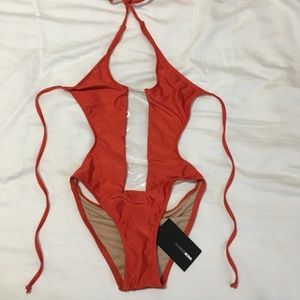 One piece orange bathing suit